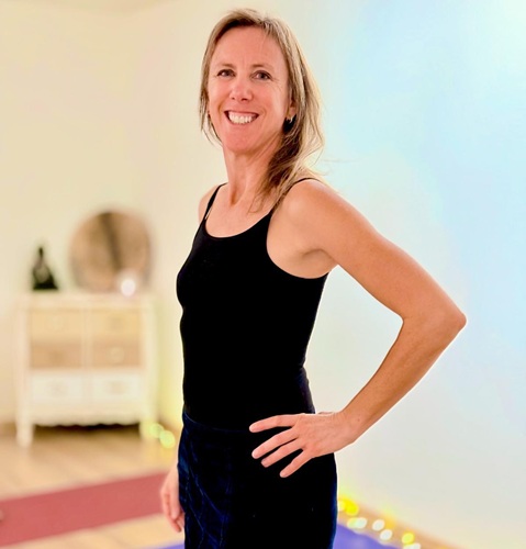 Photo de Laure assise en tailleur